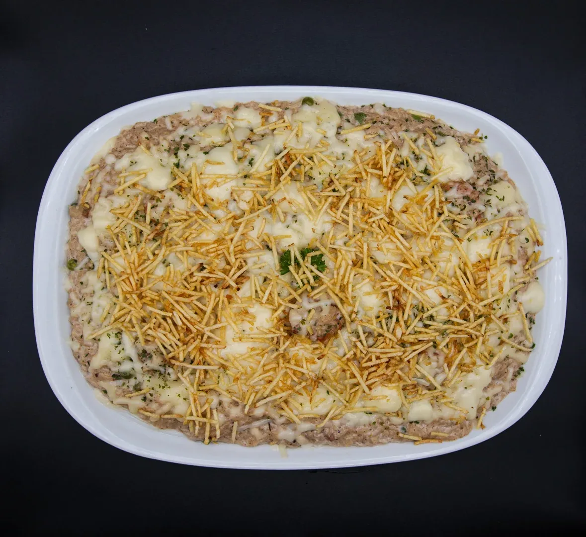 Fricassê de frango cremoso, com batata palha